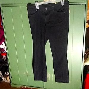 Black denim jeans with mid rise & straight leg.